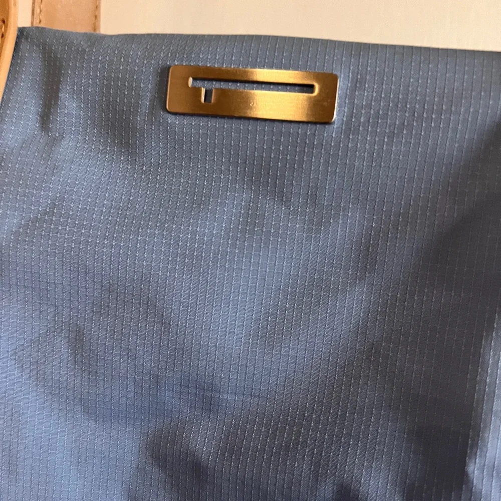 Tumi light blue